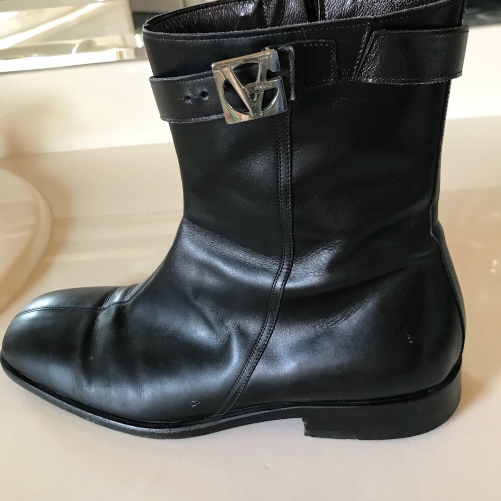 Versace boots gently used.